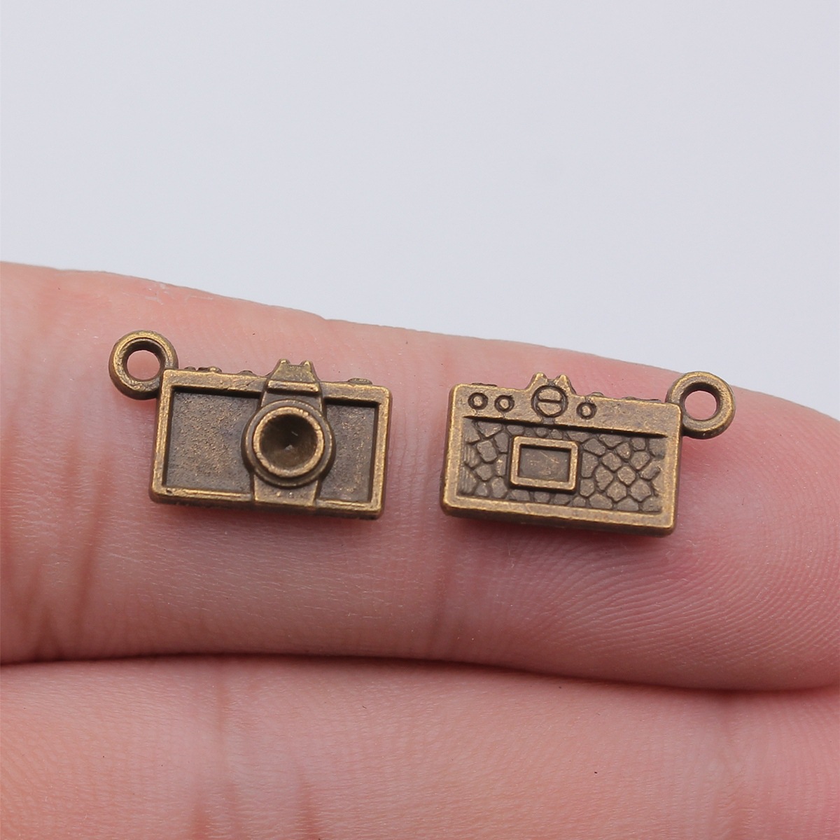 20 piezas de dijes para cámara - Jewelry Making Videos reseña y precio
